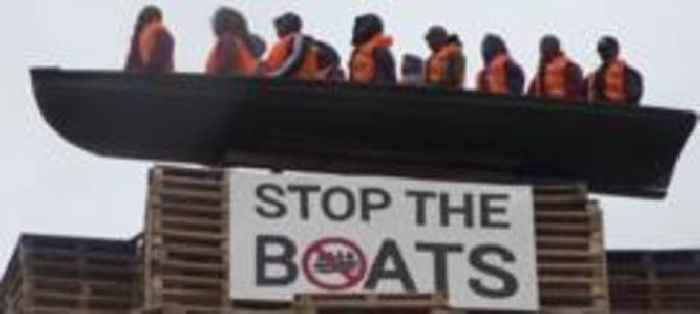 Church leaders condemn bonfire effigy of refugees in small boat