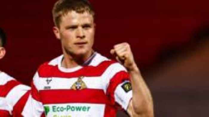 Doncaster defender McGrath signs new deal