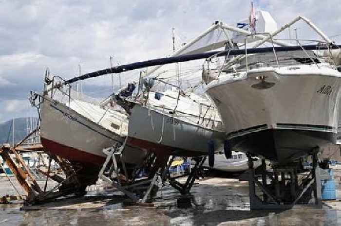 Chaos as freak storm leaves cars crushed and roofs blown off in holiday hotspot