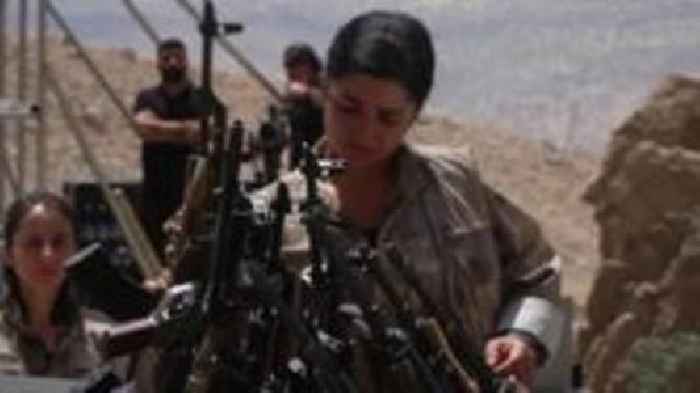 Kurdish PKK burns guns in big step towards ending Turkey conflict