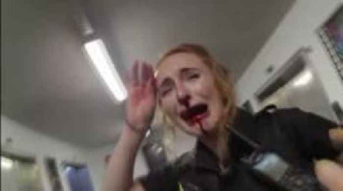 Footage shows sobbing PC after airport punch