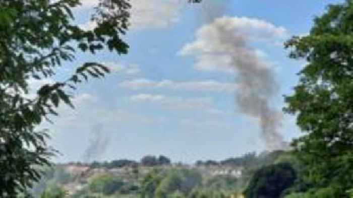 Two separate fires send smoke plumes over town