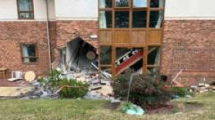 Two residents die after car crashes into care home following police chase