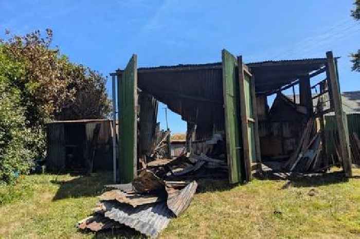 Building destroyed in blaze after 'poorly' parked vehicles block fire engine