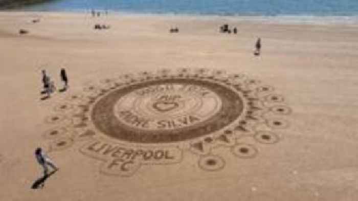 Sand tribute to Diogo Jota & Andre Silva on beach