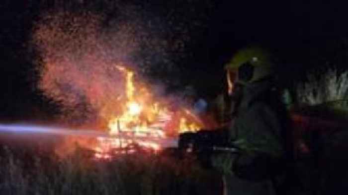 Fire crews tackle large wood blaze