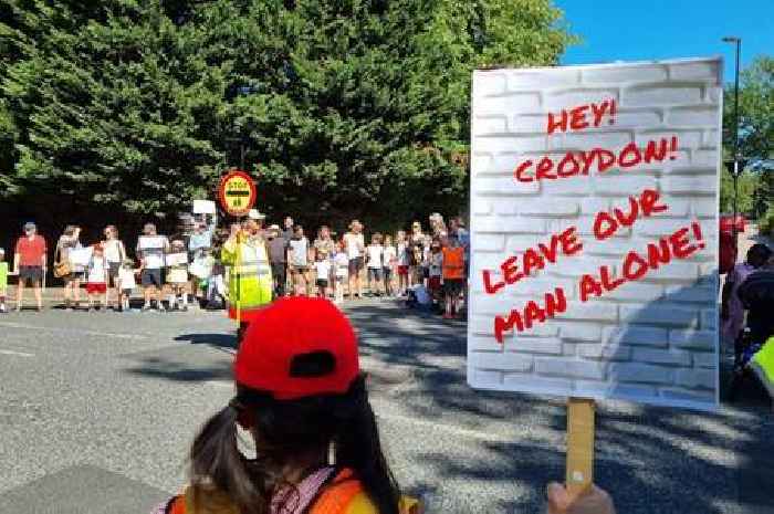 South London school kids form protective ring around lollipop man as council plans to axe him