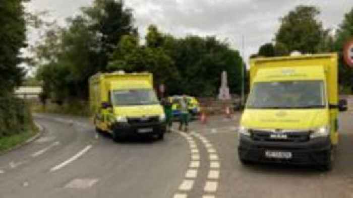 Child dies after school coach 'flips over' near Devon border