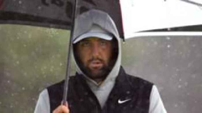 Scheffler leads from Fitzpatrick at rain-hit Open