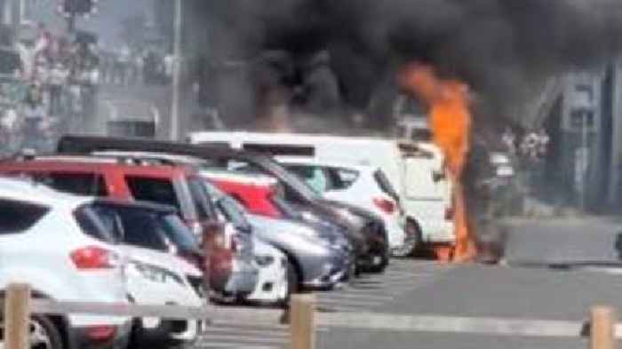 Van blaze in town car park caught on camera