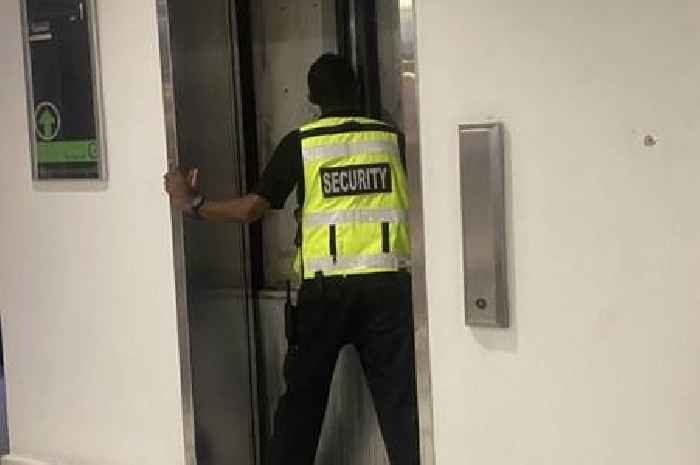 People trapped in shopping centre lift as security guard forces open doors to get them air