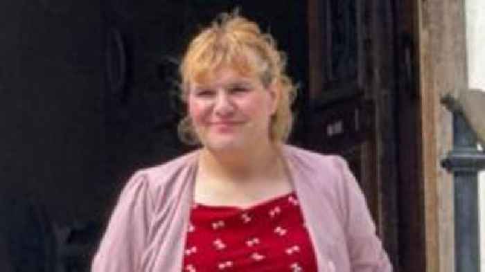 Ex-Tory MP in court over false passport charge