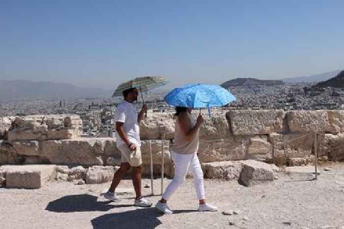 Greece introduces new bans as health officials issue 44C heatwave alert