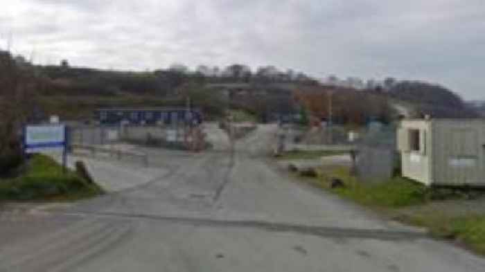 Firefighters tackle large blaze at waste site