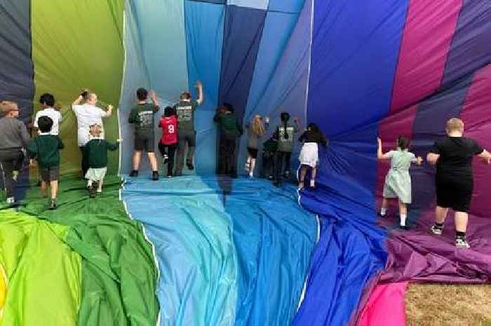 Hot air balloon lands in school playground as Fiesta fever spreads