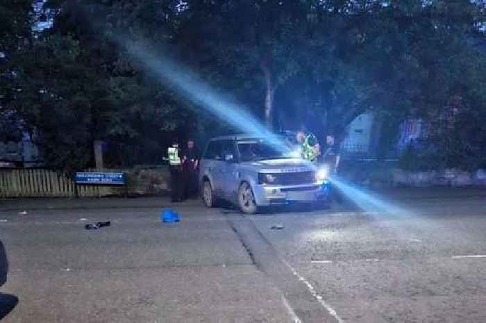 Police hunt runaway driver as Range Rover crashes on West Lothian street