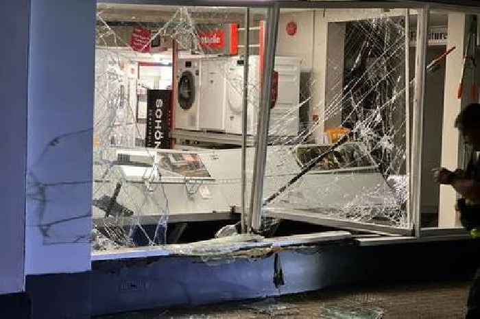 A Jaguar F-Pace was driven into this shop and £6,000 of goods were stolen