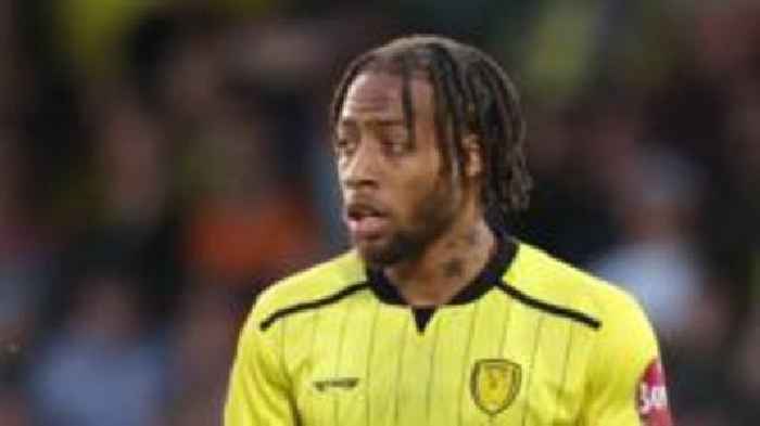 QPR sign Jamaica striker Burrell from Burton