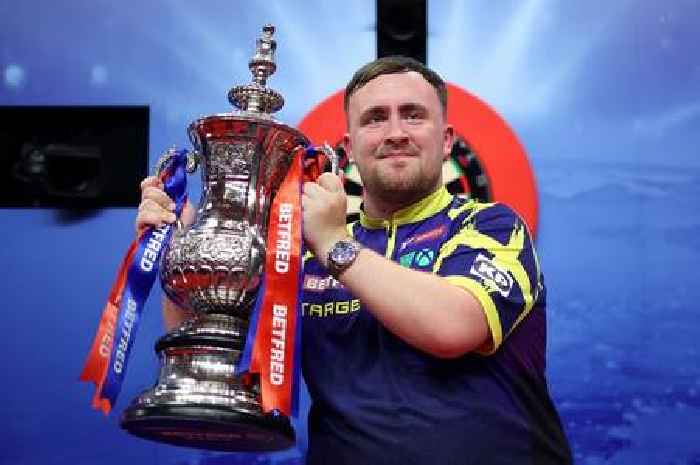 Luke Littler is darts Triple Crown king as the Nuke savours seeing his name being added to idol's trophy