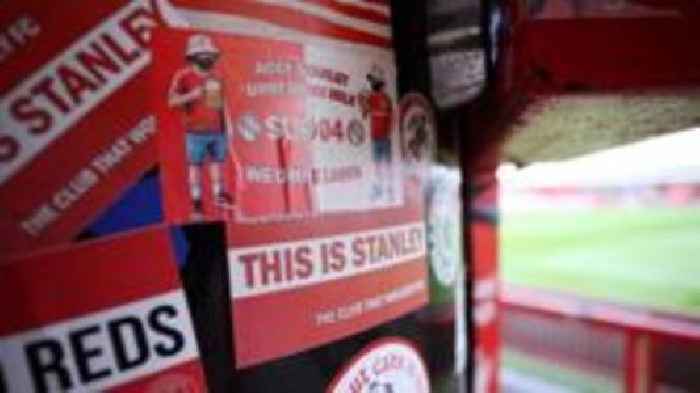 Football fan banned for running onto pitch