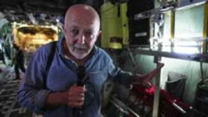 Watch: BBC's Jeremy Bowen goes onboard a plane dropping aid into Gaza