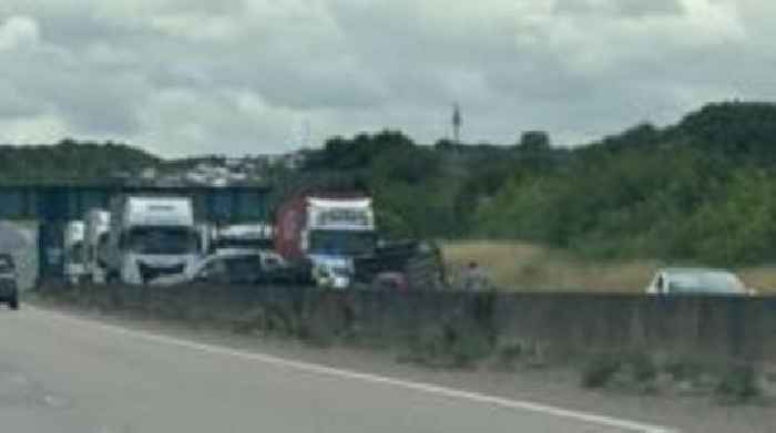 Delays on A46 after vehicle and trailer overturn