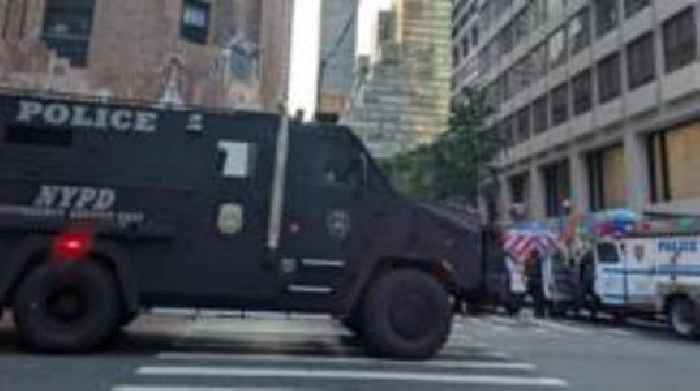 Officer among four killed in New York City building shooting