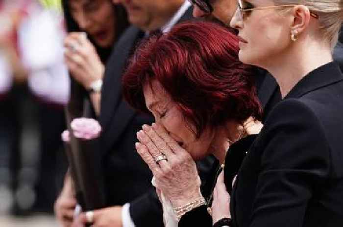 Sharon Osbourne breaks down in tears as she views tributes to Ozzy during procession