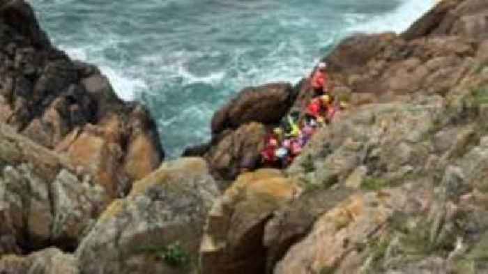 Multiple crews rescue injured person from rocks