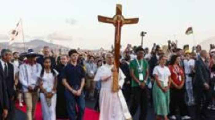 Pope greeted by vast crowd at Catholic youth event
