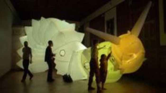 Inflatable snail robot goes on show in city centre