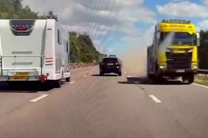 Lorry speeds down wrong side of motorway inches from head-on smash