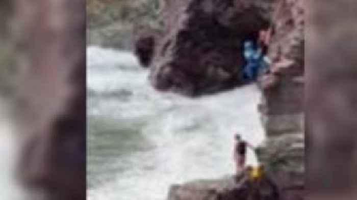 Warning after two teens rescued from rocky ledge