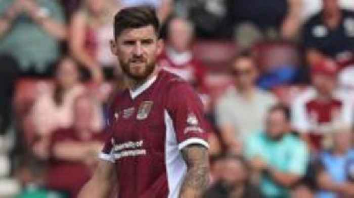 Colchester sign Northampton centre-back Baldwin
