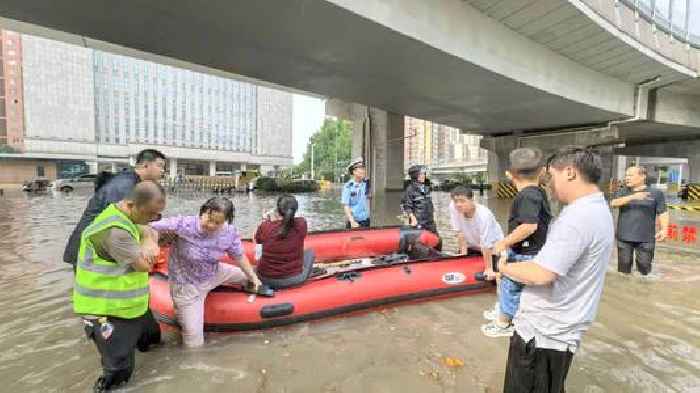 China orders 'all-out' rescue operation as 10 killed and dozens missing after floods