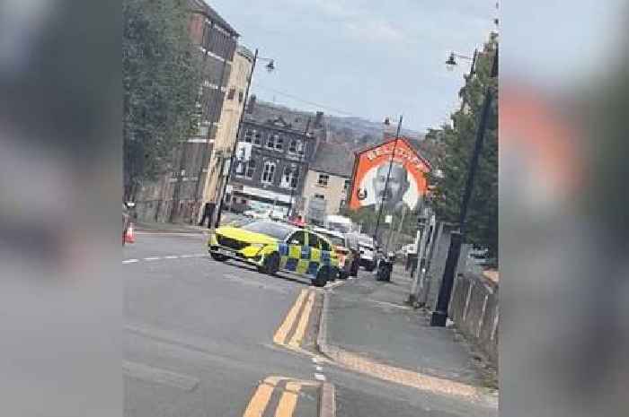 Paramedics called in as 'man on roof' forces police to shut Stoke-on-Trent road