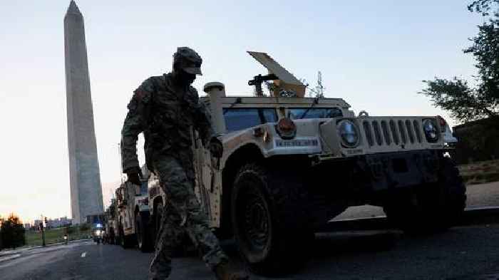 National Guard arrives on streets of Washington DC despite 'historic' lows in crime