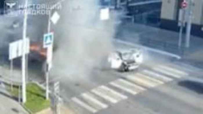 Watch: Passengers escape car hit by drone in Russia