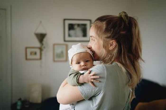 Unlikely couple offer to hold new baby before mum realises who they really are