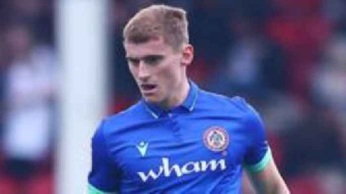 Peterborough sign Accrington midfielder Woods