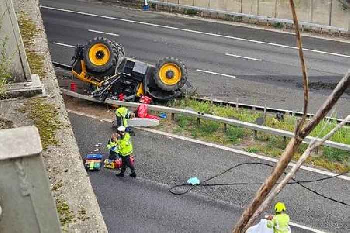 Tractor falls from bridge in horror M20 crash as man airlifted to hospital