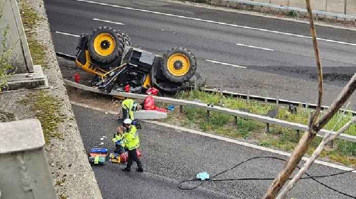 Man seriously injured after tractor falls off bridge on to motorway