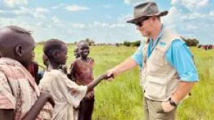 Aid worker returns to base where he hid from bullets