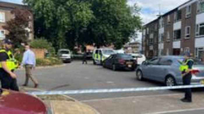Man arrested on suspicion of murder after woman dies