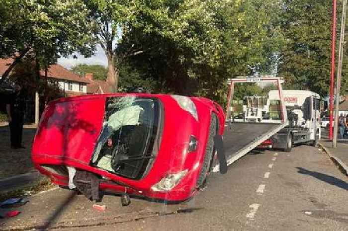 Man arrested as car flips on main Birmingham road after police chase