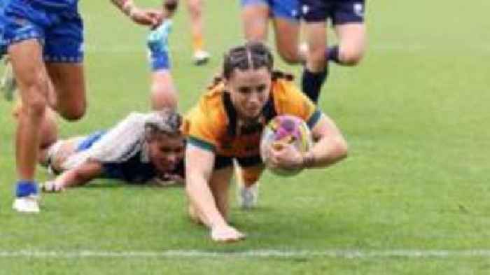 Australia's Miller bags hat-trick in record 11-try win