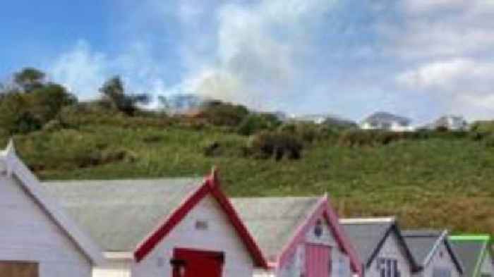 Firefighters tackle blaze on railway embankment