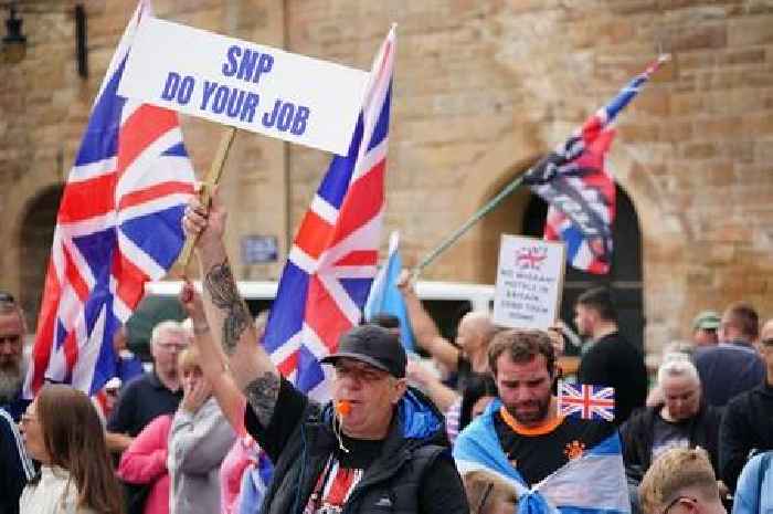 Protesters clash outside Scots asylum hotel as police work to manage crowds