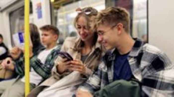 Transport for London asks 'nuisance' mobile users to wear headphones