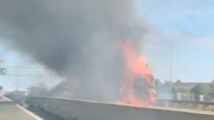Video shows explosion as lorry engulfed by flames